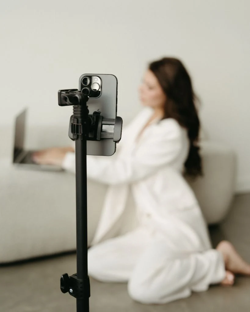 Behind the scenes creator setup with smartphone on tripod